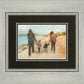 Family Walk On The Beach