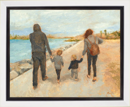 Family Walk On The Beach