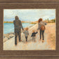 Family Walk On The Beach