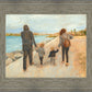 Family Walk On The Beach