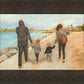 Family Walk On The Beach