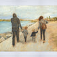 Family Walk On The Beach